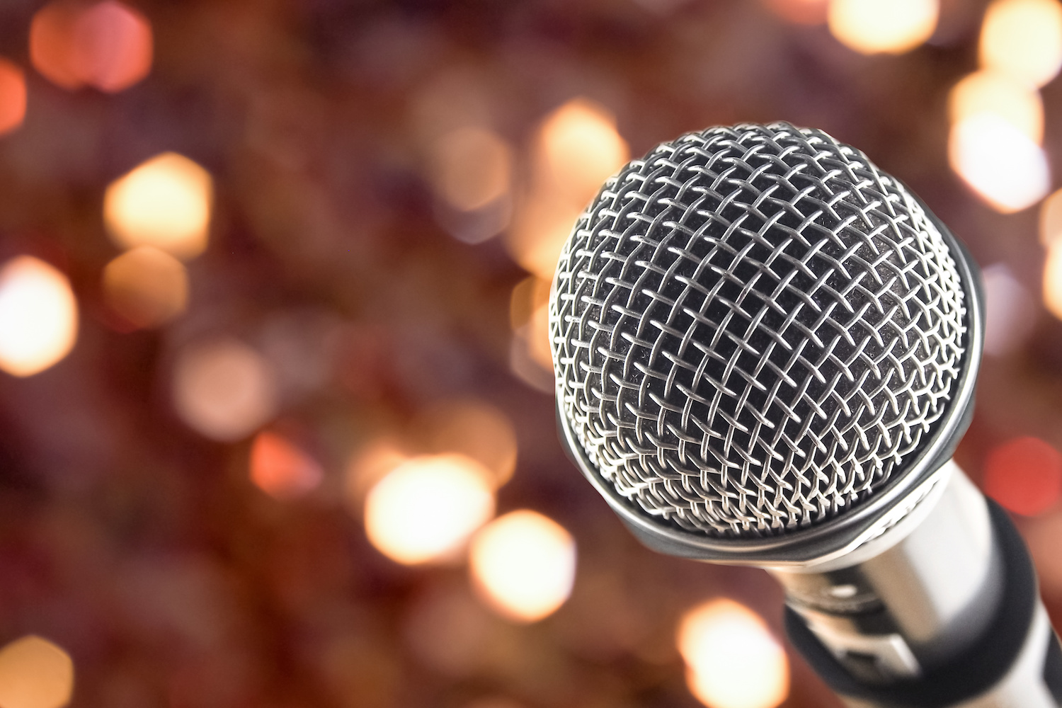 close up microphone on night bokeh background abstract